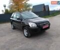Чорний Кіа Sportage, об'ємом двигуна 2 л та пробігом 150 тис. км за 7000 $, фото 25 на Automoto.ua