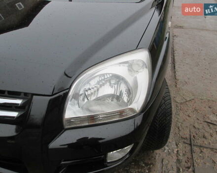 Черный Киа Sportage, объемом двигателя 2 л и пробегом 213 тыс. км за 7700 $, фото 9 на Automoto.ua