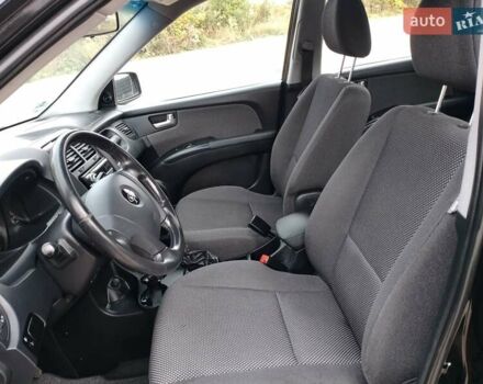 Чорний Кіа Sportage, об'ємом двигуна 2 л та пробігом 150 тис. км за 7000 $, фото 31 на Automoto.ua