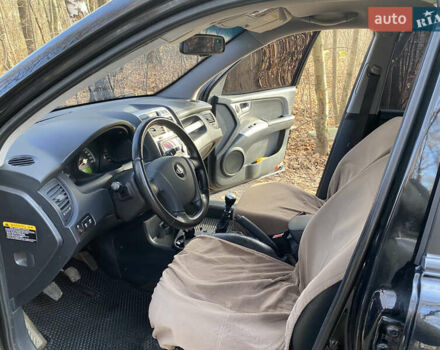 Черный Киа Sportage, объемом двигателя 1.99 л и пробегом 350 тыс. км за 8400 $, фото 9 на Automoto.ua