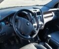 Черный Киа Sportage, объемом двигателя 2 л и пробегом 208 тыс. км за 7500 $, фото 1 на Automoto.ua