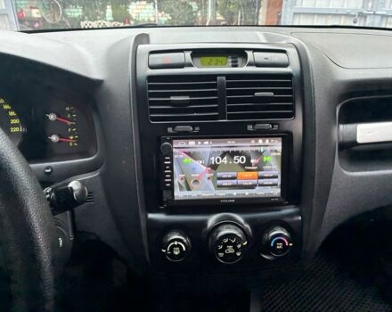 Черный Киа Sportage, объемом двигателя 2 л и пробегом 322 тыс. км за 7000 $, фото 6 на Automoto.ua