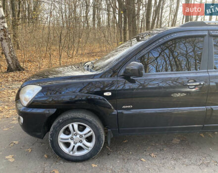 Черный Киа Sportage, объемом двигателя 1.99 л и пробегом 350 тыс. км за 8400 $, фото 2 на Automoto.ua