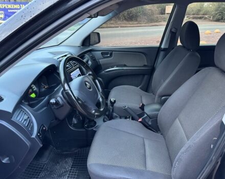 Чорний Кіа Sportage, об'ємом двигуна 2 л та пробігом 180 тис. км за 6700 $, фото 12 на Automoto.ua