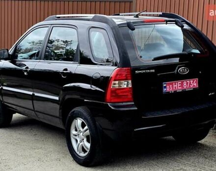 Чорний Кіа Sportage, об'ємом двигуна 2 л та пробігом 172 тис. км за 7999 $, фото 24 на Automoto.ua