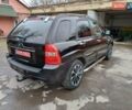 Черный Киа Sportage, объемом двигателя 2 л и пробегом 160 тыс. км за 7777 $, фото 1 на Automoto.ua