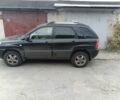 Черный Киа Sportage, объемом двигателя 2 л и пробегом 307 тыс. км за 4800 $, фото 1 на Automoto.ua