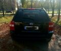 Чорний Кіа Sportage, об'ємом двигуна 2 л та пробігом 263 тис. км за 8100 $, фото 4 на Automoto.ua