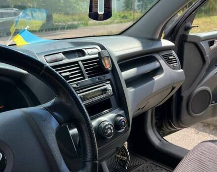 Чорний Кіа Sportage, об'ємом двигуна 1.98 л та пробігом 200 тис. км за 7900 $, фото 11 на Automoto.ua