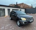 Чорний Кіа Sportage, об'ємом двигуна 2 л та пробігом 180 тис. км за 6700 $, фото 1 на Automoto.ua