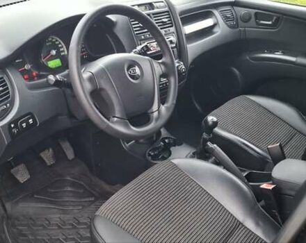Черный Киа Sportage, объемом двигателя 2 л и пробегом 170 тыс. км за 8700 $, фото 11 на Automoto.ua