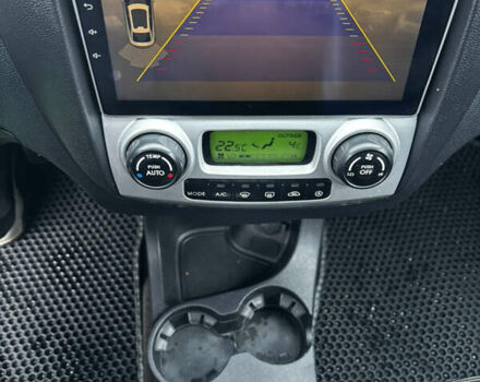 Чорний Кіа Sportage, об'ємом двигуна 2 л та пробігом 250 тис. км за 8300 $, фото 27 на Automoto.ua