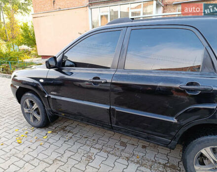 Чорний Кіа Sportage, об'ємом двигуна 1.98 л та пробігом 232 тис. км за 7900 $, фото 4 на Automoto.ua