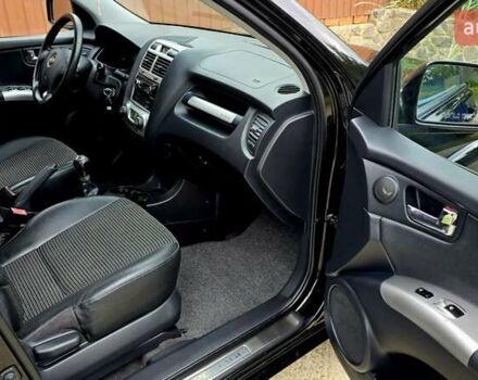 Чорний Кіа Sportage, об'ємом двигуна 2 л та пробігом 172 тис. км за 7999 $, фото 48 на Automoto.ua