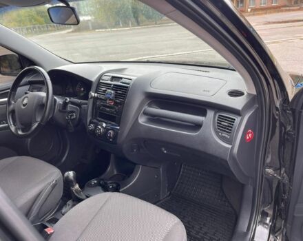 Черный Киа Sportage, объемом двигателя 2 л и пробегом 202 тыс. км за 6500 $, фото 7 на Automoto.ua