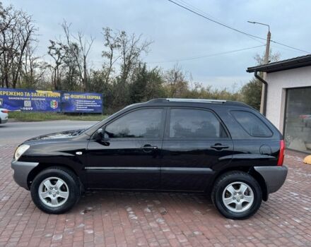 Чорний Кіа Sportage, об'ємом двигуна 2 л та пробігом 180 тис. км за 6700 $, фото 6 на Automoto.ua