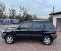 Чорний Кіа Sportage, об'ємом двигуна 2 л та пробігом 180 тис. км за 6700 $, фото 6 на Automoto.ua