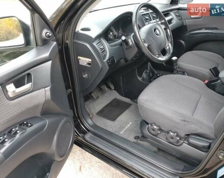 Чорний Кіа Sportage, об'ємом двигуна 2 л та пробігом 150 тис. км за 7000 $, фото 30 на Automoto.ua