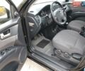 Чорний Кіа Sportage, об'ємом двигуна 2 л та пробігом 150 тис. км за 7000 $, фото 30 на Automoto.ua