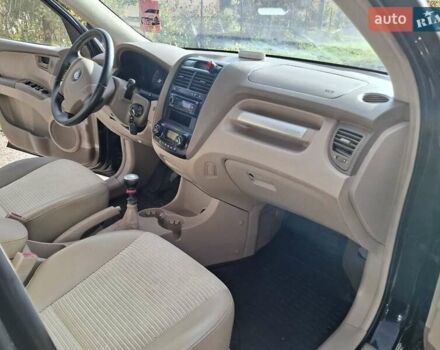 Черный Киа Sportage, объемом двигателя 1.99 л и пробегом 283 тыс. км за 6850 $, фото 44 на Automoto.ua