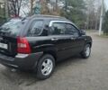 Чорний Кіа Sportage, об'ємом двигуна 2 л та пробігом 207 тис. км за 7000 $, фото 5 на Automoto.ua