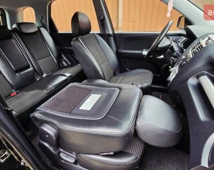 Чорний Кіа Sportage, об'ємом двигуна 2 л та пробігом 172 тис. км за 7999 $, фото 51 на Automoto.ua