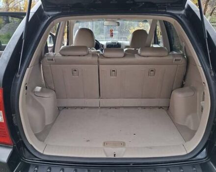 Черный Киа Sportage, объемом двигателя 1.99 л и пробегом 283 тыс. км за 6850 $, фото 40 на Automoto.ua
