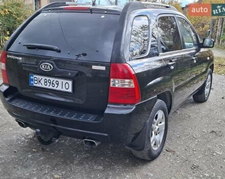 Черный Киа Sportage, объемом двигателя 1.99 л и пробегом 283 тыс. км за 6850 $, фото 2 на Automoto.ua