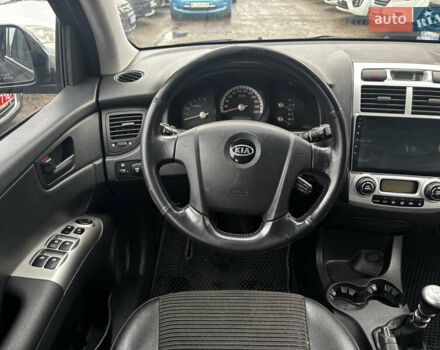 Чорний Кіа Sportage, об'ємом двигуна 2 л та пробігом 250 тис. км за 8300 $, фото 17 на Automoto.ua