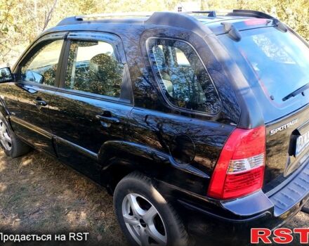 Чорний Кіа Sportage, об'ємом двигуна 2 л та пробігом 197 тис. км за 6900 $, фото 4 на Automoto.ua