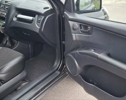 Черный Киа Sportage, объемом двигателя 2 л и пробегом 170 тыс. км за 8700 $, фото 18 на Automoto.ua