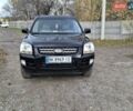 Черный Киа Sportage, объемом двигателя 1.99 л и пробегом 283 тыс. км за 6850 $, фото 14 на Automoto.ua