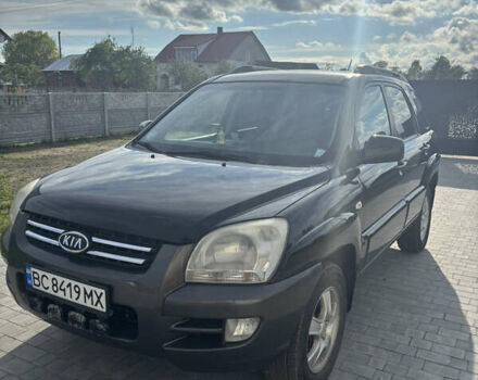 Черный Киа Sportage, объемом двигателя 2 л и пробегом 300 тыс. км за 6800 $, фото 1 на Automoto.ua