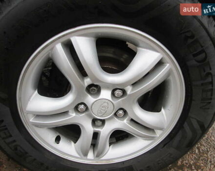 Черный Киа Sportage, объемом двигателя 2 л и пробегом 213 тыс. км за 7700 $, фото 10 на Automoto.ua