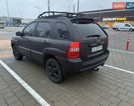 Черный Киа Sportage, объемом двигателя 2 л и пробегом 322 тыс. км за 7000 $, фото 2 на Automoto.ua