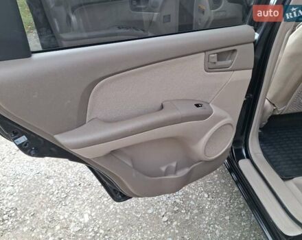 Черный Киа Sportage, объемом двигателя 1.99 л и пробегом 283 тыс. км за 6850 $, фото 42 на Automoto.ua