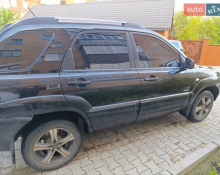 Чорний Кіа Sportage, об'ємом двигуна 1.98 л та пробігом 232 тис. км за 7900 $, фото 6 на Automoto.ua