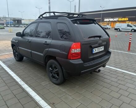 Черный Киа Sportage, объемом двигателя 2 л и пробегом 322 тыс. км за 7000 $, фото 3 на Automoto.ua