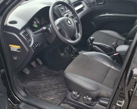 Черный Киа Sportage, объемом двигателя 2 л и пробегом 170 тыс. км за 8700 $, фото 12 на Automoto.ua