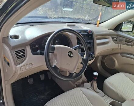 Черный Киа Sportage, объемом двигателя 1.99 л и пробегом 283 тыс. км за 6850 $, фото 20 на Automoto.ua