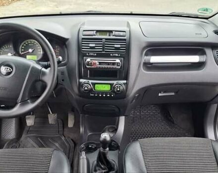 Черный Киа Sportage, объемом двигателя 2 л и пробегом 170 тыс. км за 8700 $, фото 19 на Automoto.ua