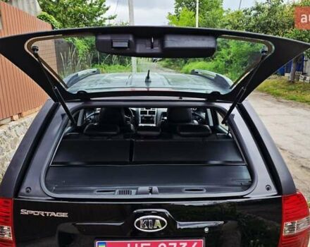 Чорний Кіа Sportage, об'ємом двигуна 2 л та пробігом 172 тис. км за 7999 $, фото 58 на Automoto.ua