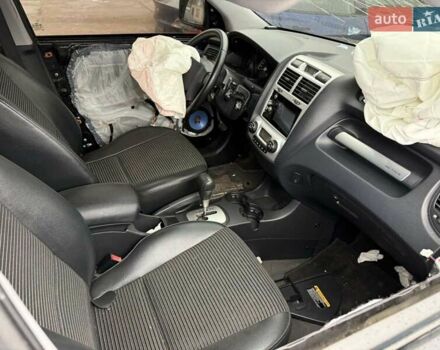 Черный Киа Sportage, объемом двигателя 1.99 л и пробегом 219 тыс. км за 3300 $, фото 13 на Automoto.ua