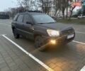 Черный Киа Sportage, объемом двигателя 2 л и пробегом 322 тыс. км за 7000 $, фото 1 на Automoto.ua