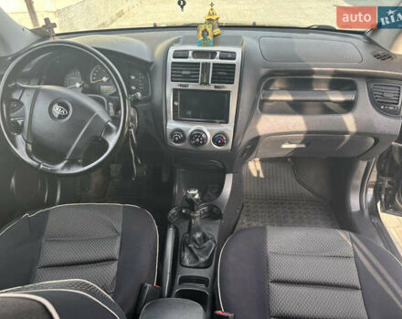 Черный Киа Sportage, объемом двигателя 2 л и пробегом 300 тыс. км за 6800 $, фото 6 на Automoto.ua
