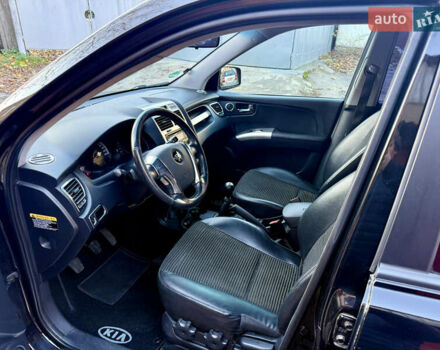 Черный Киа Sportage, объемом двигателя 2 л и пробегом 159 тыс. км за 7650 $, фото 11 на Automoto.ua