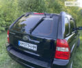 Черный Киа Sportage, объемом двигателя 1.98 л и пробегом 223 тыс. км за 7600 $, фото 2 на Automoto.ua
