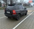 Черный Киа Sportage, объемом двигателя 2 л и пробегом 322 тыс. км за 7000 $, фото 3 на Automoto.ua