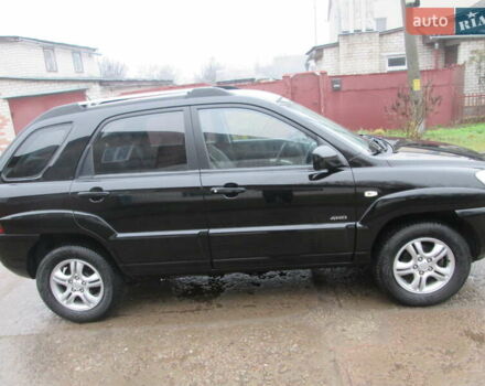 Черный Киа Sportage, объемом двигателя 2 л и пробегом 213 тыс. км за 7700 $, фото 2 на Automoto.ua