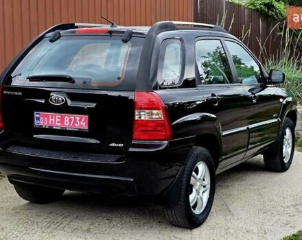 Чорний Кіа Sportage, об'ємом двигуна 2 л та пробігом 172 тис. км за 7999 $, фото 18 на Automoto.ua